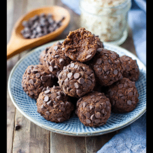 No-bake cottage cheese brownie batter protein bites on a kitchen counter